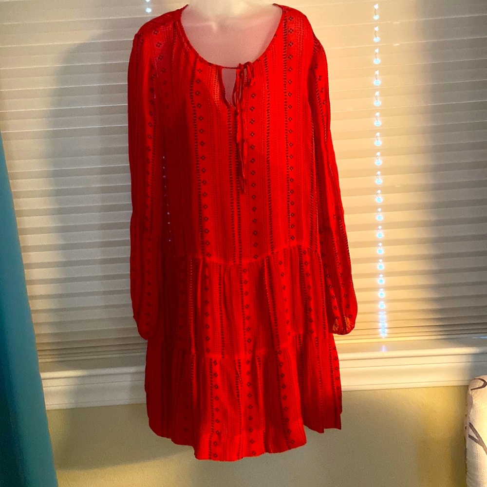 Red printed loose dress with tie top.